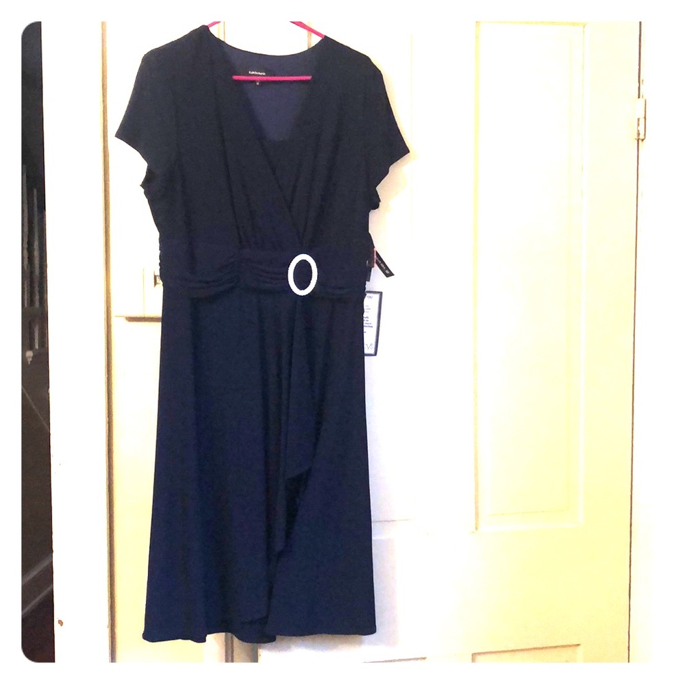 Navy knee length dress with rhinestone accent